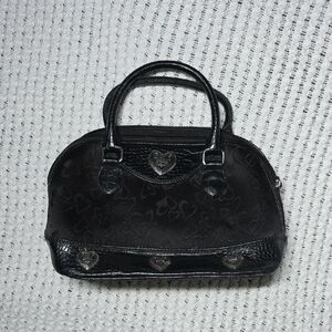 Elegant Black Handbag with Heart Accents